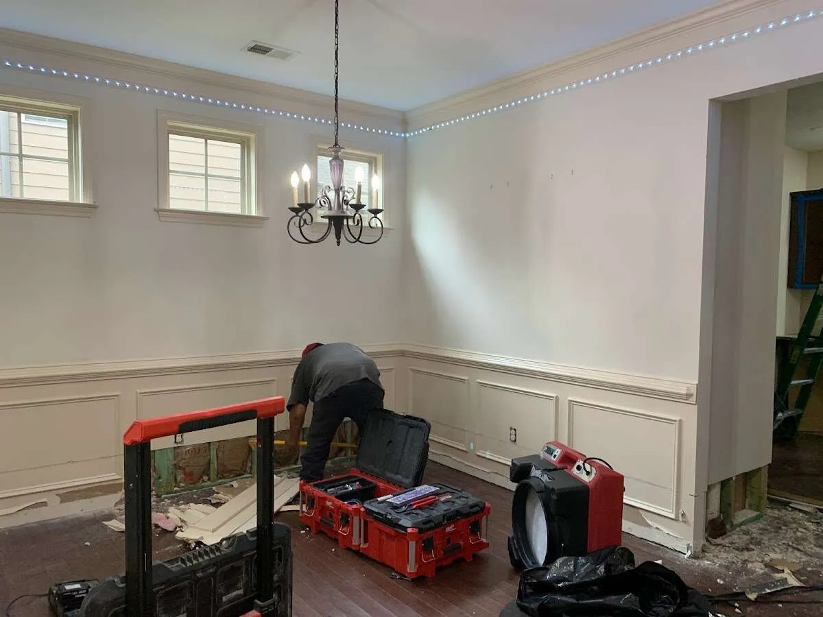 Restoration technician with professional equipment in Elmsford