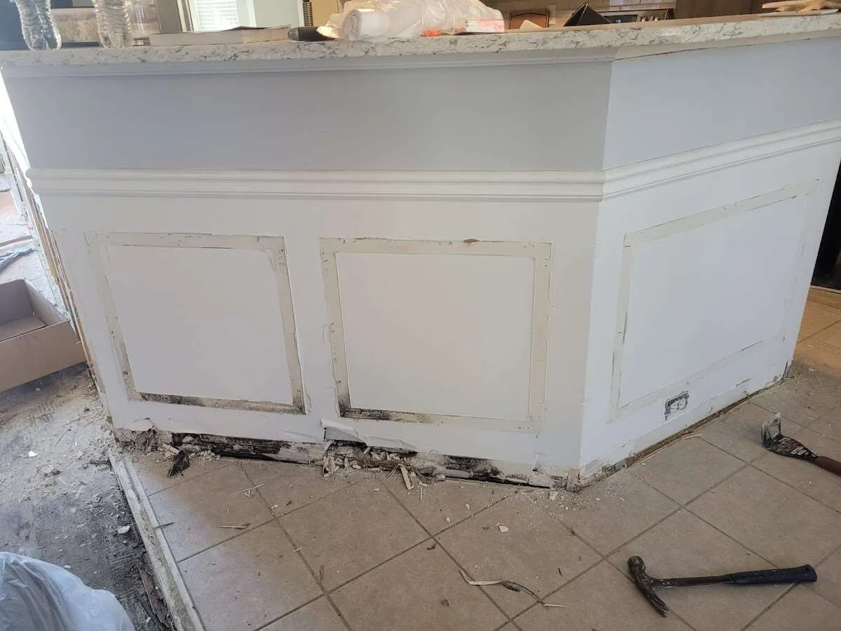 Water damage and mold on kitchen during Storm Damage Restoration in Elmsford
